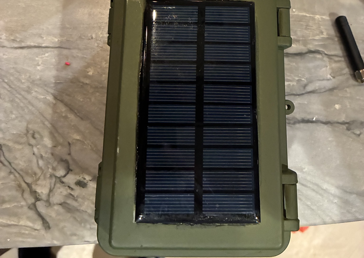 Finished TALON R1 enclosure with solar panel and antenna attached